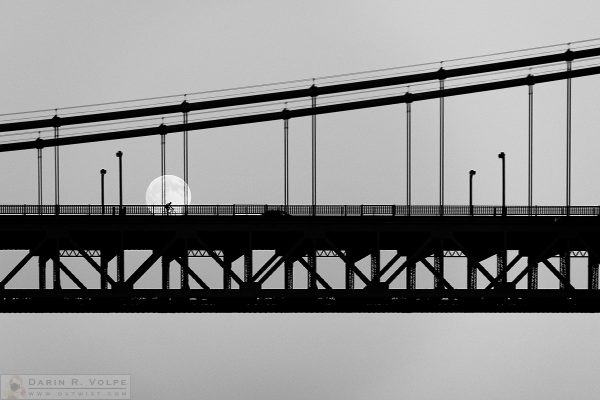 "Moonlight Ride" [Bicyclist on the Golden Gate Bridge in San Francisco, California]