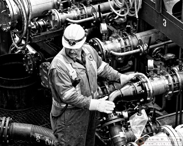 "Fill 'er Up" [Workman Aboard a Fuel Tanker in Halifax, Nova Scotia]