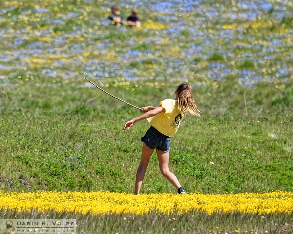 "A Swing and a Miss" [Girl Playing in Flower Field in Santa Margarita, California]